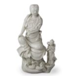 A good Dehua Figure of Guanyin, sensitively modelled beneath a glaze of soft ivory tone, Mark of