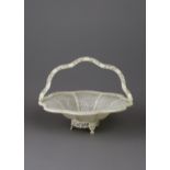 An elegant thinly carved and pierced Canton Ivory Basket, c 1860 W21.5cm L8cm carved from eight thin