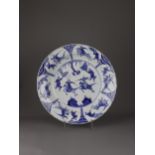 A blue and white 'warriors' basin, Kangxi Period, Qing Dynasty - - D 37.5cm H 8cm - - with a central