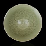 A Yaozhou peony moulded bowl, Northern Song Dynasty - - D19cm H8.5cm. - Compare a Yaozhou celadon