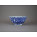 A finely painted blue and white 'sea creatures' Bowl, Six character underglaze blue seal mark of