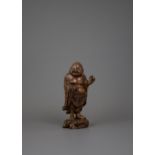 A boxwood figure of Budai, 19th century H15cm L8cm W5.5cm the fat cheerful figure holding a rosary