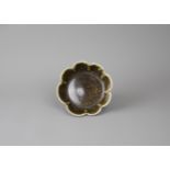 A Flower shaped Blackware Dish, Southern Song Dynasty - - W11.2cm H3.5cm - - with rounded lobed