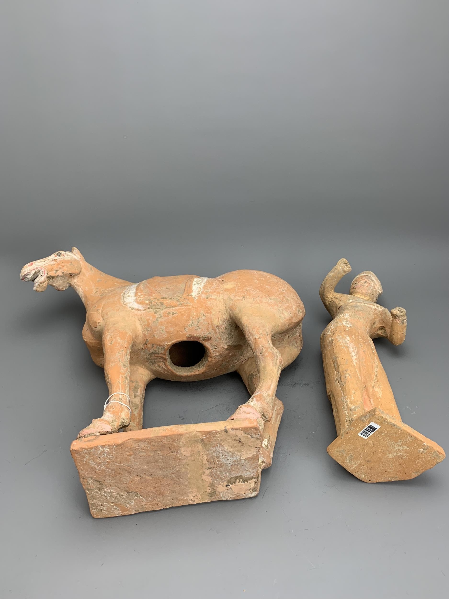 A Painted Pottery Model of a Horse and Foreign Groom, Tang Dynasty - - Horse H 36.5cm - - The - Image 4 of 4