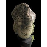 A Stone Head of a Bodhisattva, Song Dynasty. H 41 cm the grey stone carved with an elaborate
