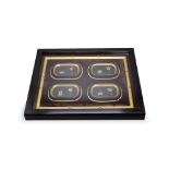 A set of four black and gilt lacquer dishes, Meiji period - - The frameL51cm W41.8cm - - of
