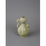 A celadon double gourd ewer, Song Dynasty - - H12 cm W7.2 cm