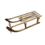 A MID 20TH CENTURY CONTINENTAL CONSTRUCTED OAK FRAME MODEL OF WINTER SLEDGE/SLEIGH Stamped on top '