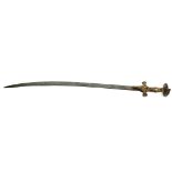 A 19TH CENTURY PERSIAN SWORD The gilded bronze grip with organic decoration, on a curved steel blade