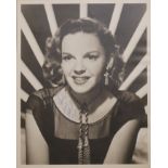 JUDY GARLAND, AN EARLY 20TH CENTURY SIGNED BLACK AND WHITE PHOTOGRAPH With an Art Deco fan design