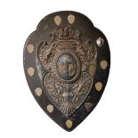 H.M.S VERNON, A LARGE EDWARDIAN SILVER PLATED PRESENTATION SHIELD. The central cartouche embossed