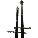 TWO THEATRICAL STEEL TWO HANDED ANDURIL MEDIEVAL SWORDS, with black faux leather grip. 101cm