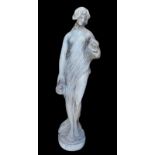 AN ART NOVEAU STYLE RECONSTITUTED STONE STATUE, a water carrier. 76cm Condition good