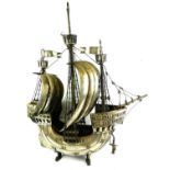 A LARGE SILVER PLATED 'NEF' GALLEON SHIP Having fluted decoration with embossed armorial shields and