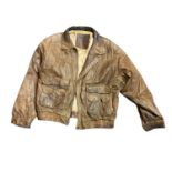 ABLC, A VINTAGE BROWN LEATHER FLYING JACKET Beige fabric interior with vintage aircraft print (