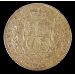 AN EARLY VICTORIAN 22CT GOLD FULL SOVEREIGN COIN Dated 1844 with a young Victoria portrait and