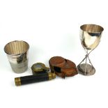 AN EARLY 20TH CENTURY BRASS AND LEATHER TELESCOPE, three pull drawer with black leather cover,