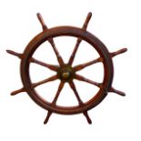 A LARGE EARLY 20TH CENTURY PINE AND BRASS SHIPS WHEEL 133cm Condition good