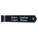A CAST IRON BLACK AND WHITE TARGET SIGN FOR POLICE STATION AND COURT HOUSE 79cm long.