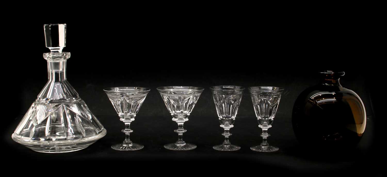 An Art Deco style 'Tudor' crystal glass decanter and four plus two glasses