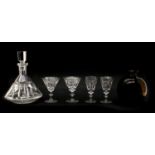 An Art Deco style 'Tudor' crystal glass decanter and four plus two glasses