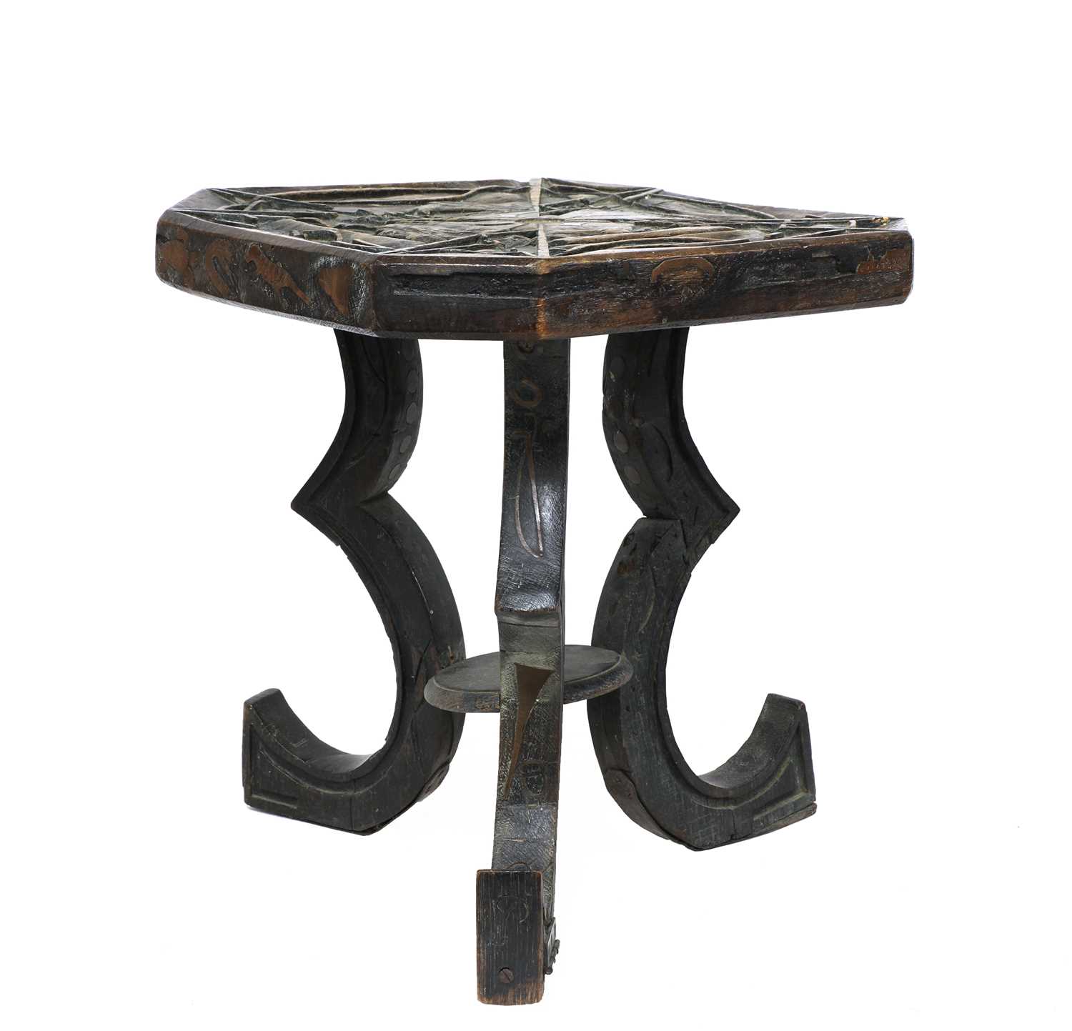 A carved and inlaid talismanic stool,