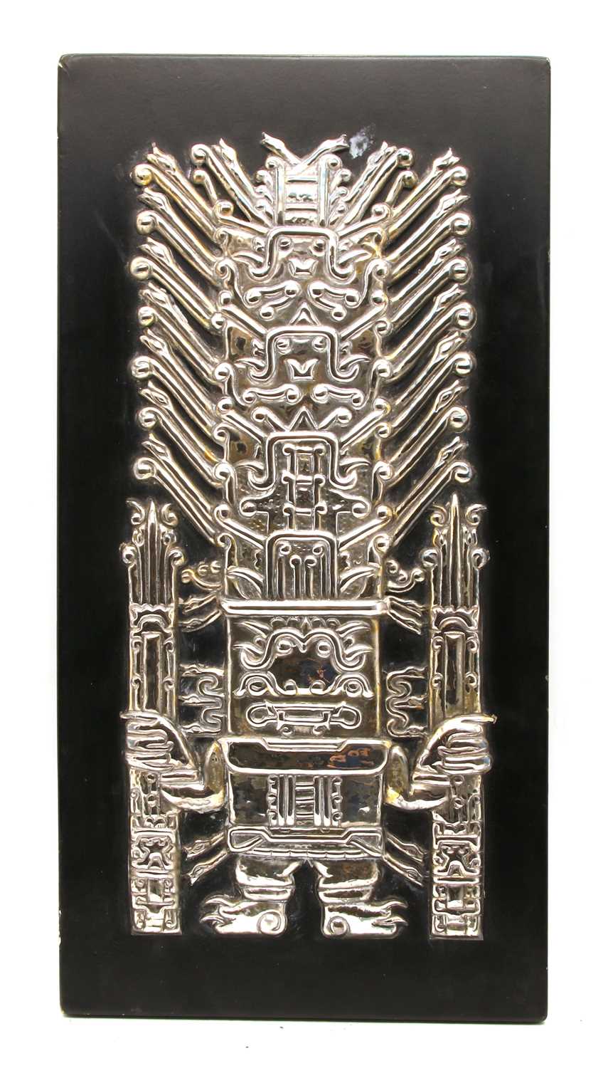 A Pre-Colombian style white metal plaque,