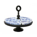 An ebonised lazy Susan