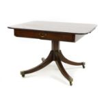 A 19th century mahogany extending pedestal dining table,