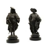 A pair of spelter figures of gentlemen,