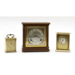 Three mantel clocks