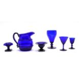 A collection of late 19th century Bristol Blue glassware,