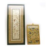 2 framed Oriental needlework panels