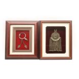 Two framed items of jewellery,