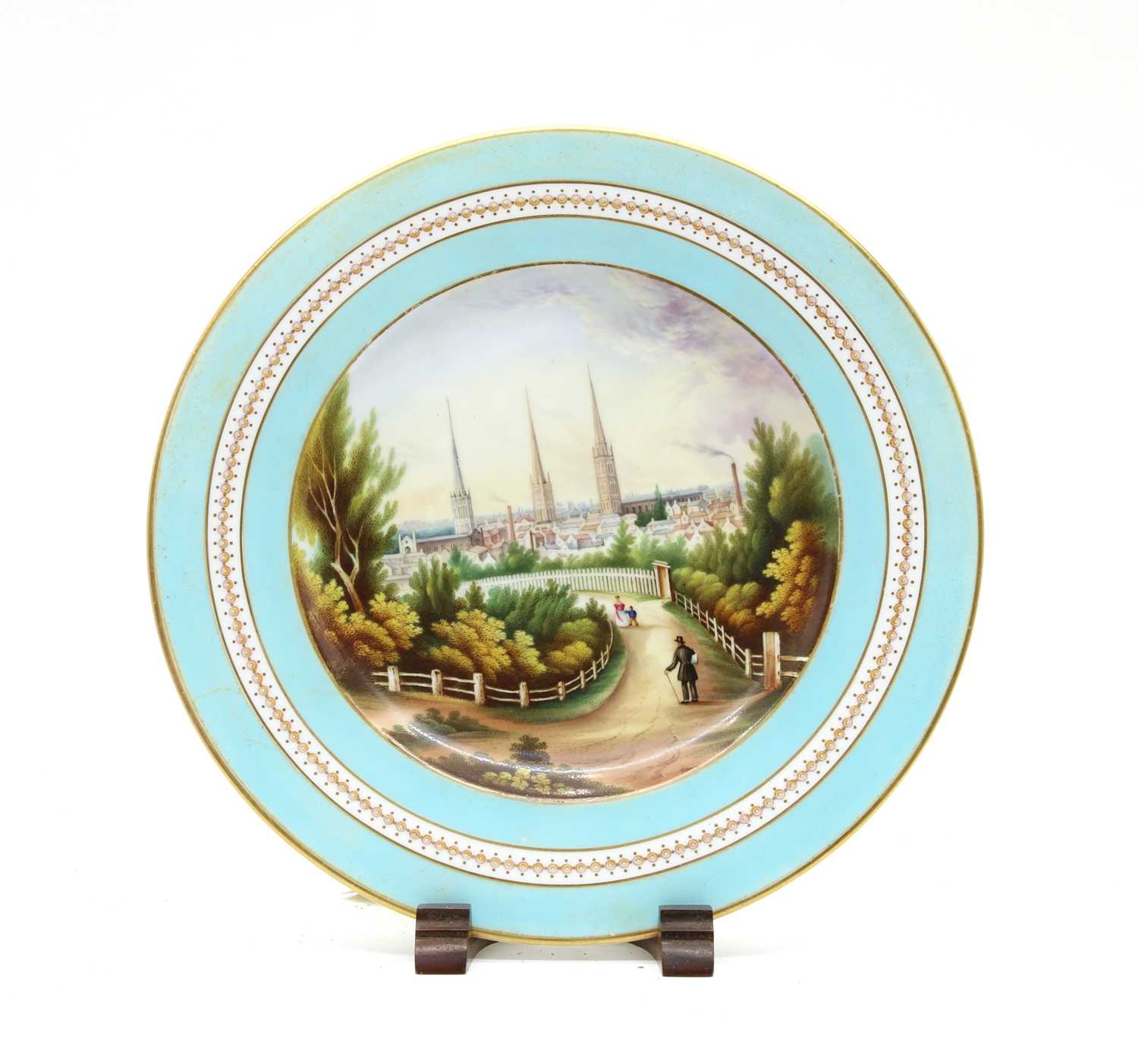 A painted and gilt-heightened porcelain cabinet plate