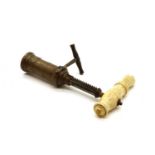 A brass and ivory handled Thomason-type barrel corkscrew,