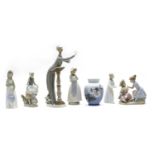 A collection of porcelain figures,