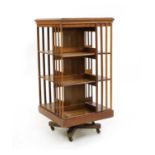 An Edwardian mahogany revolving bookcase,