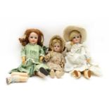 Three bisque head dolls,