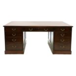 A modern mahogany partner's desk