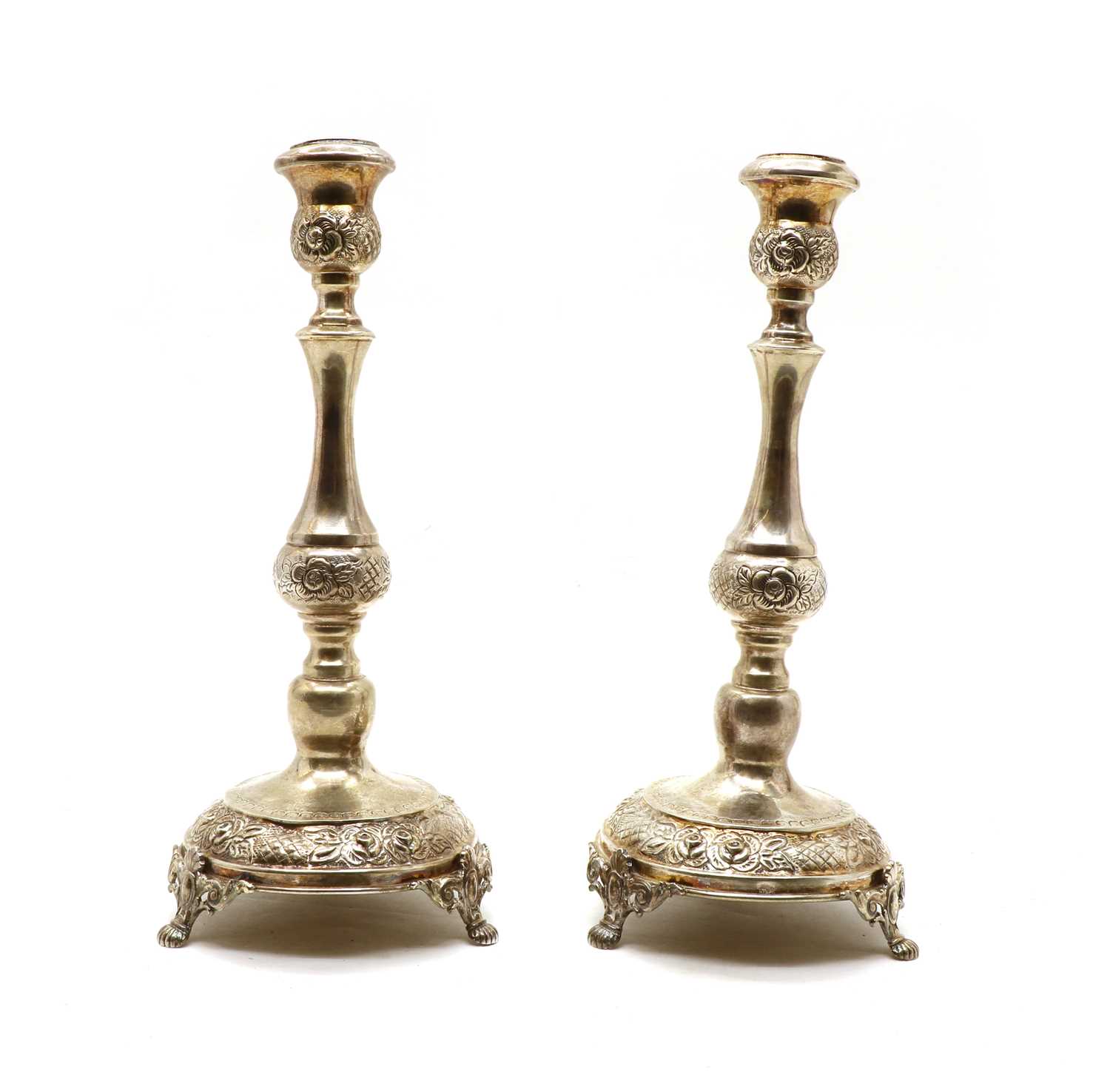 A pair of Continental silver candlesticks