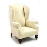 A wingback armchair,