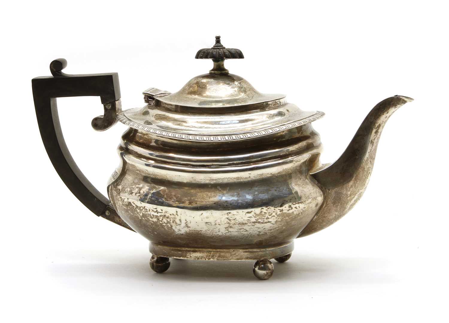 A sterling silver teapot,