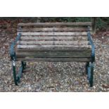 Teak and wrought iron garden bench,