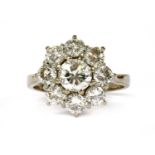 A white gold diamond cluster ring,
