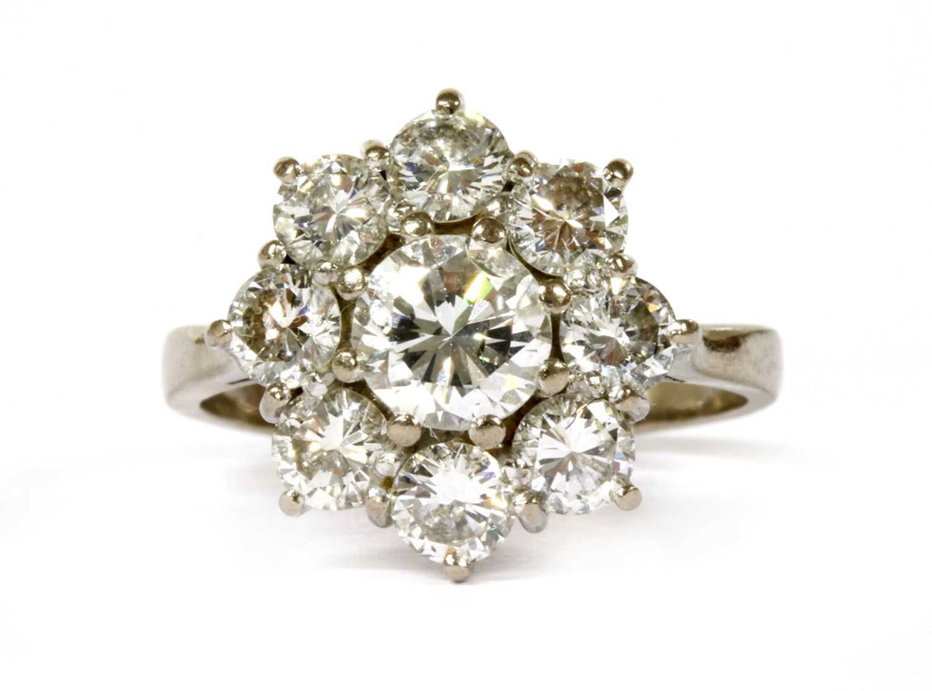 A white gold diamond cluster ring,