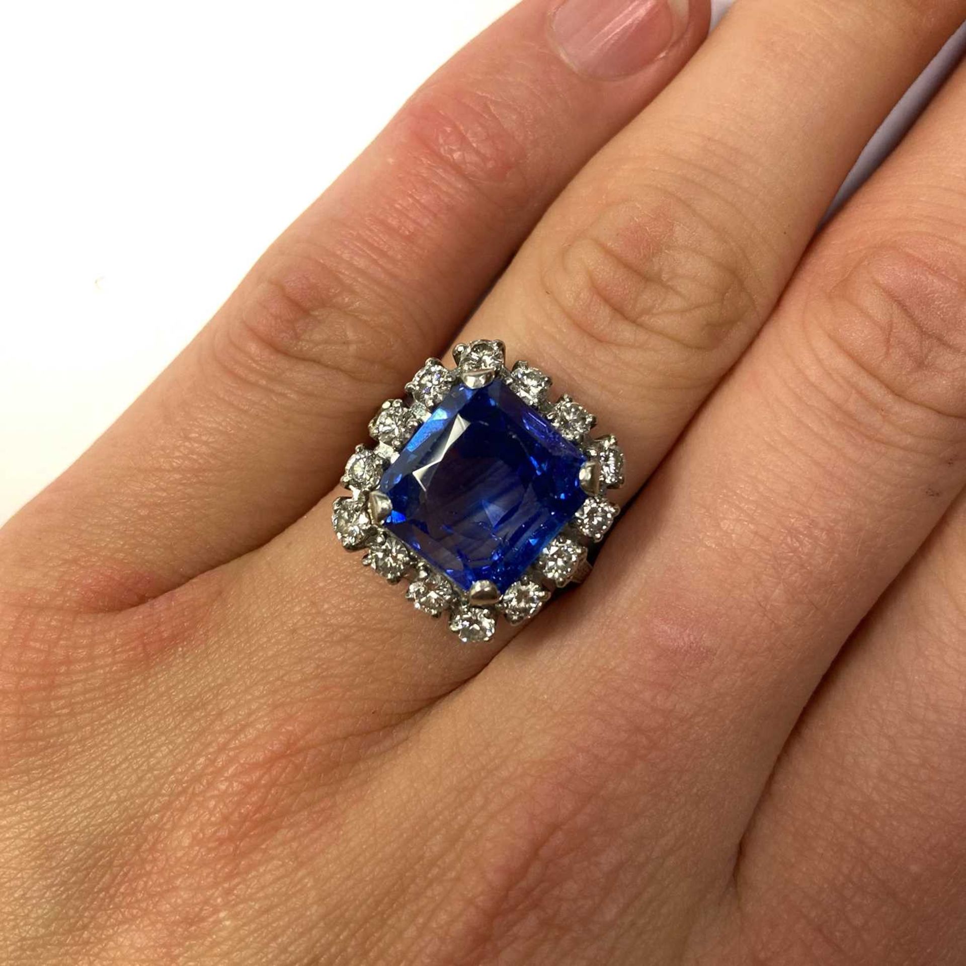 An American sapphire and diamond cushion-shaped cluster ring, - Image 3 of 3