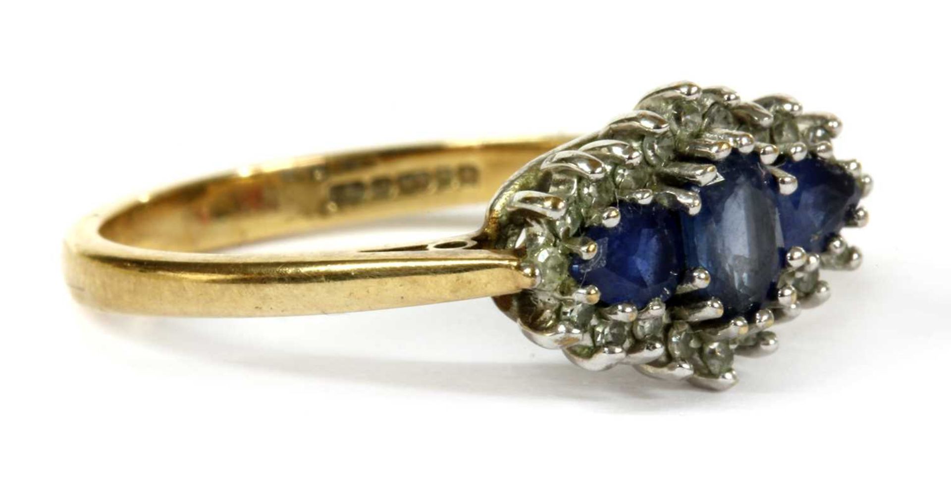 A 9ct gold sapphire and diamond three stone cluster ring, - Image 2 of 4
