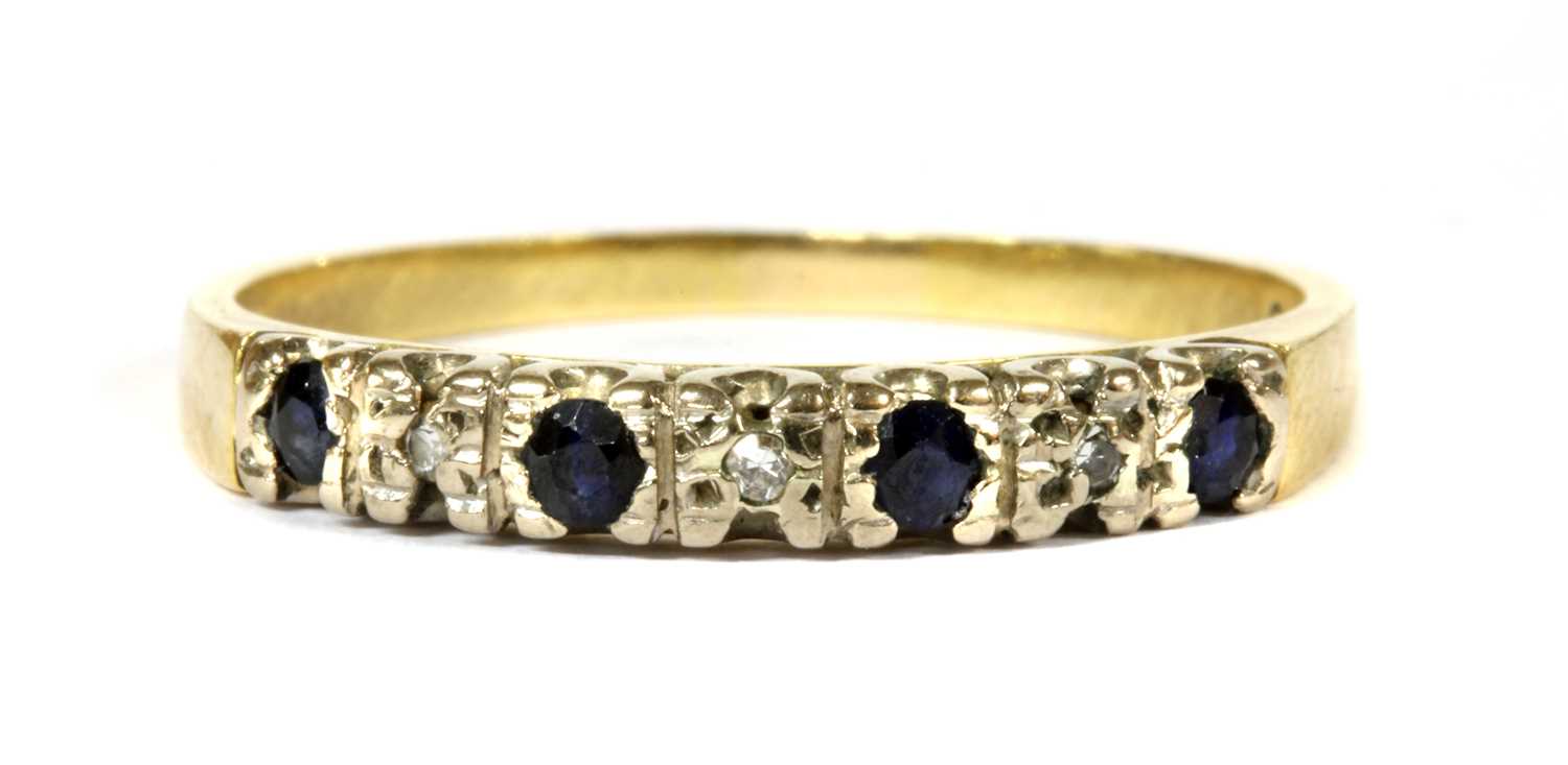 A gold sapphire and diamond ring,