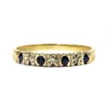 A gold sapphire and diamond ring,